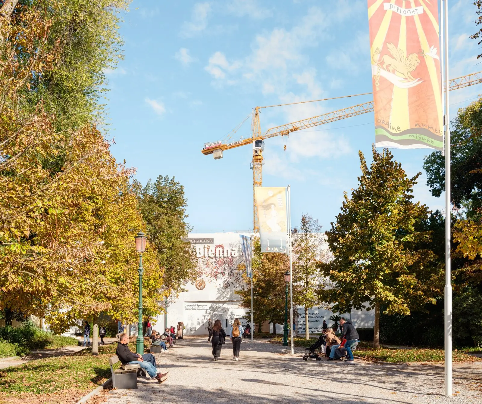 Path in the Giardini, Venice, leading to the Constructing La Biennale pavilion under a crane